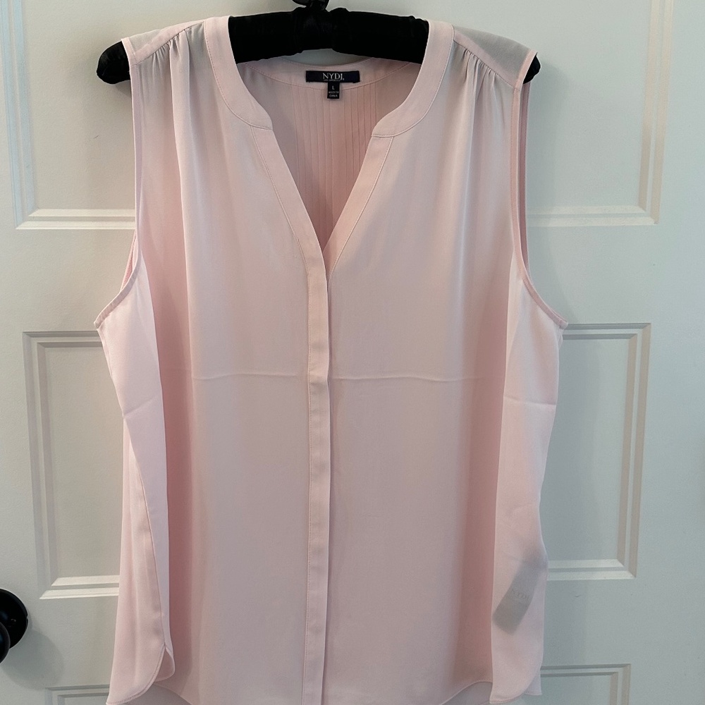 Large light pink sleeveless blouse